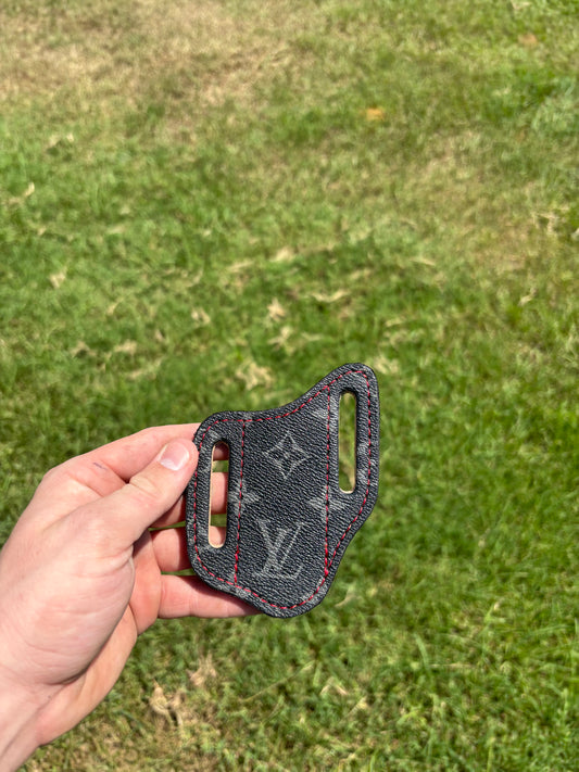 LV sheath with red stitching