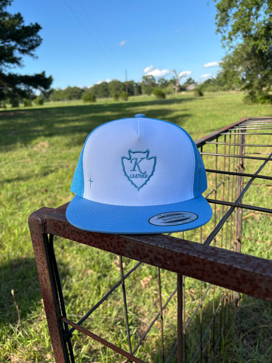 Light blue and white trucker
